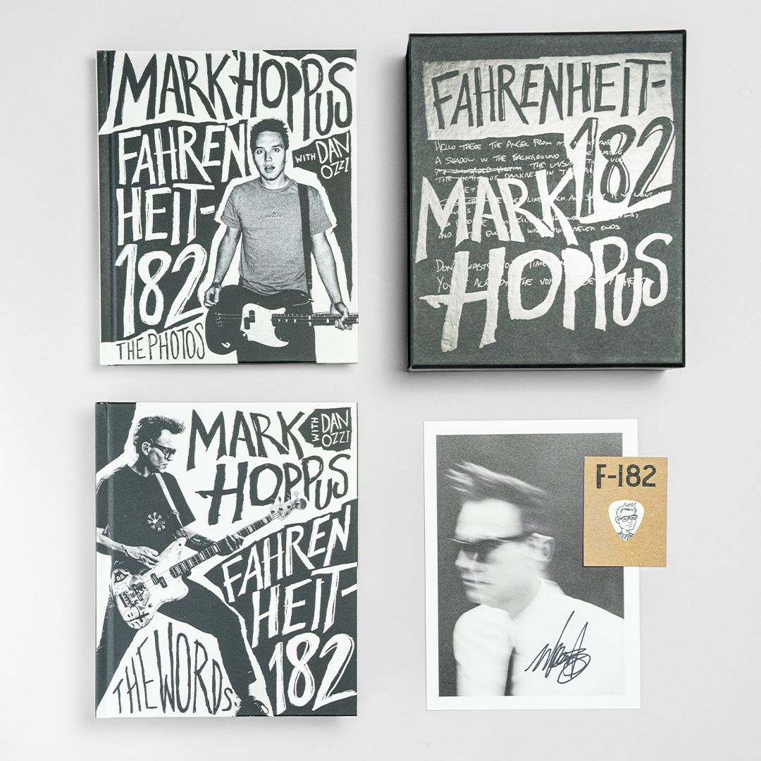 All of the elements of the special edition, including slipcase, two volumes of 'the words' and 'the photos', signed print, and plectrum.